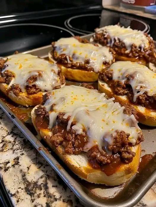 Cheesy Beef Sloppy Joes on Garlic Bread 