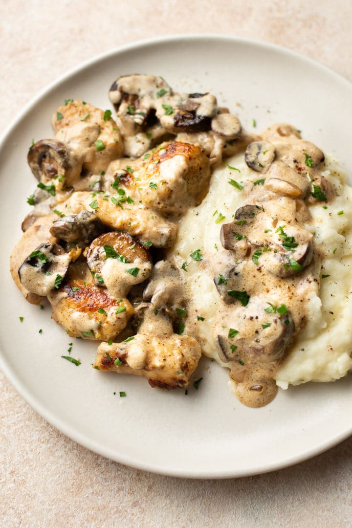 This easy chicken stroganoff recipe is a comfort food classic with a tangy sour cream sauce, plenty of mushrooms, and tender chicken pieces. It’s ready in just 30 minutes!